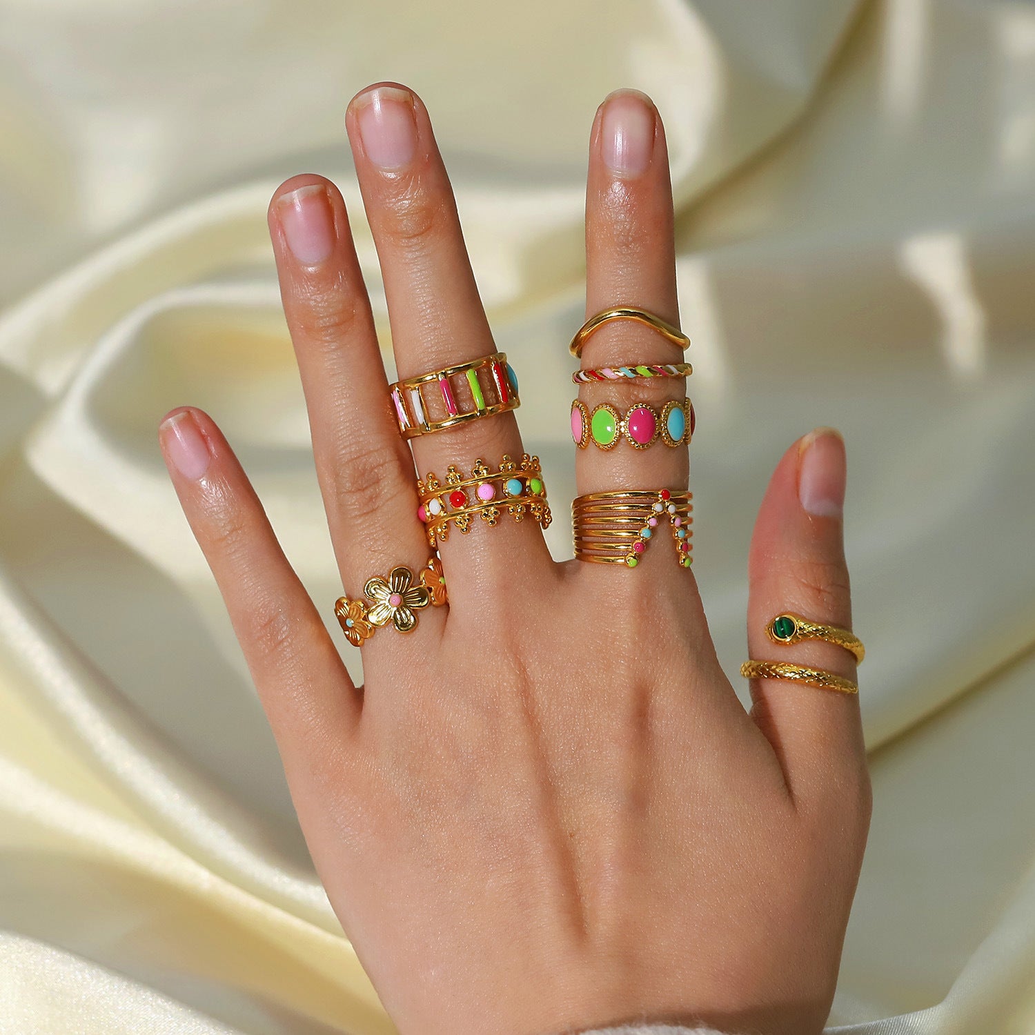 WIDE V-SHAPED RING WITH COLORED STONES